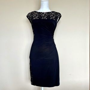 Asymmetric black lace dress with faux cutout panel